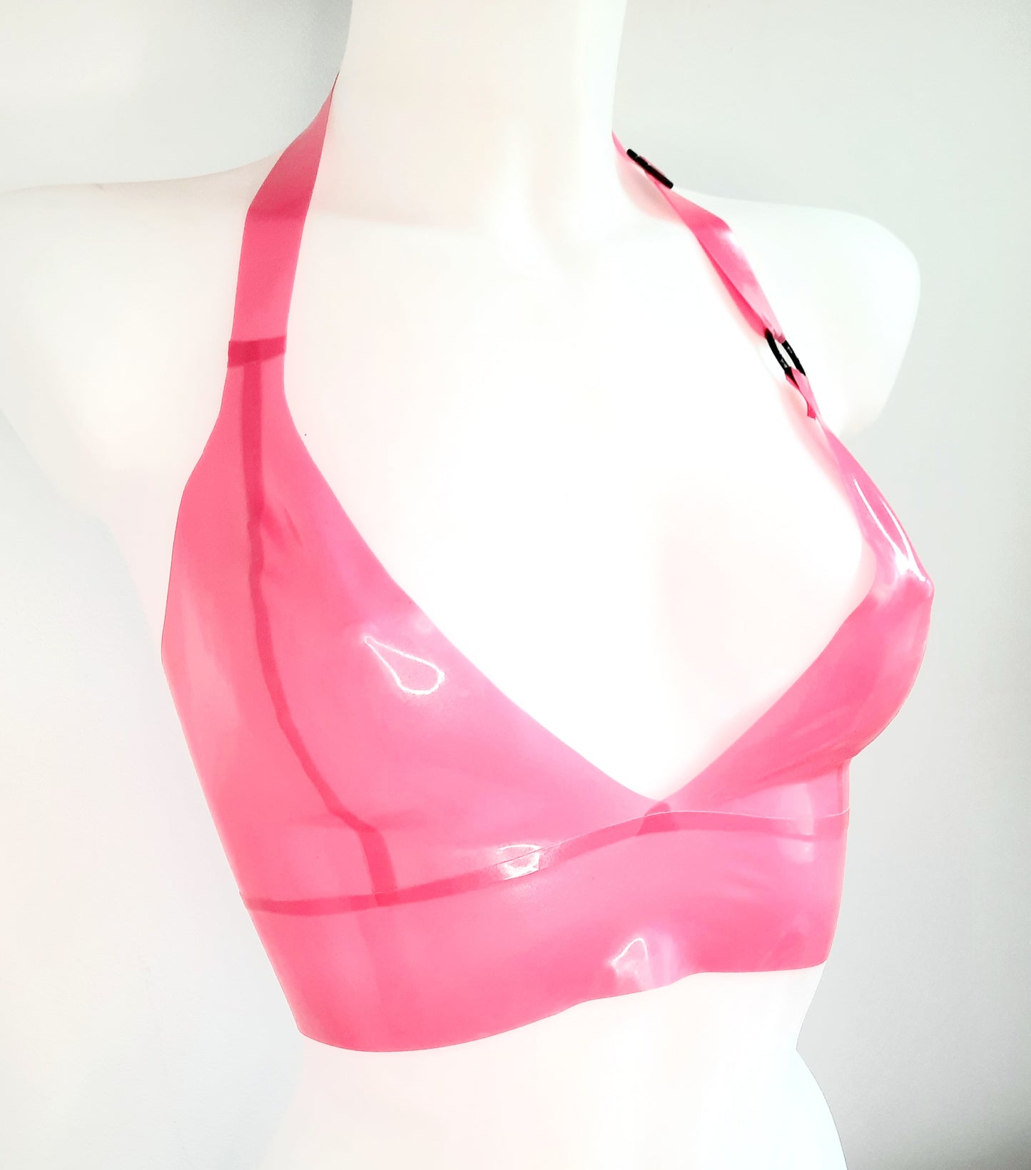 Metallic fuchsia pink latex longline bra top with black O ring & slider.