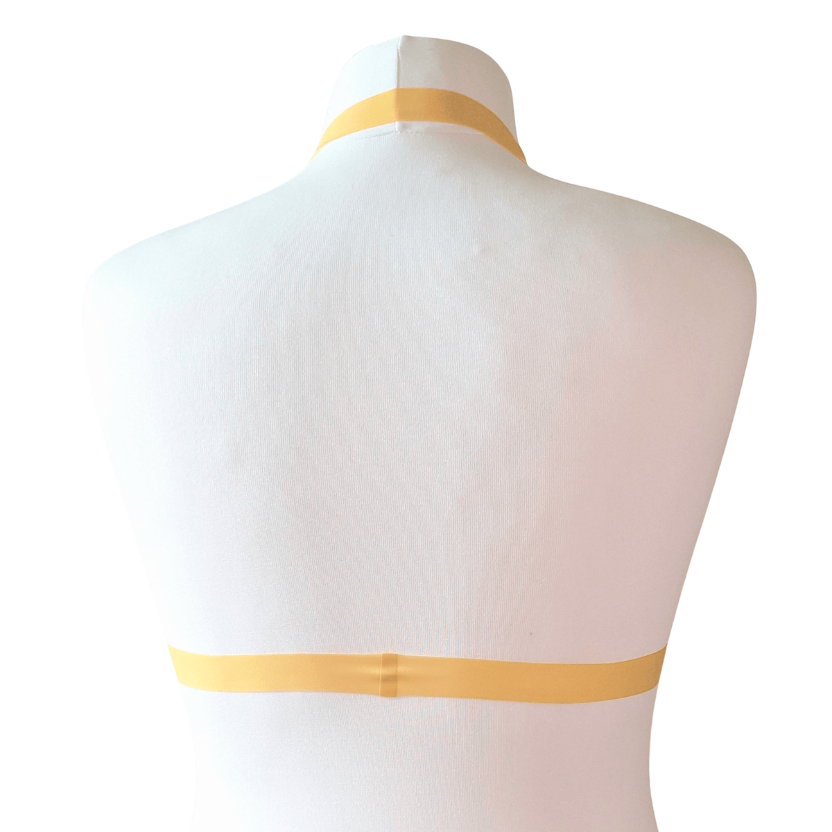 Back of A cute pearlsheen gold latex bikini bralette in size small - Small cups UK A/B with a 66cm band - stretches up to 75cm ish
Brand new sample, made for photo's
Non Wired, bikini style with halter neck strap