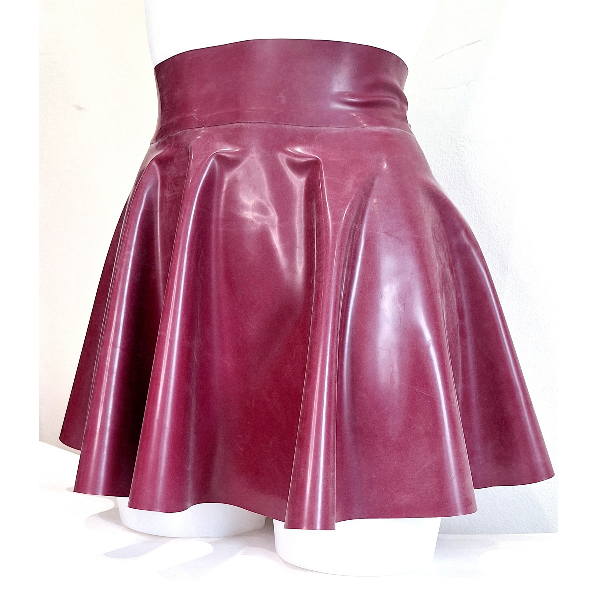 Skater skirt shown in Plum latex
