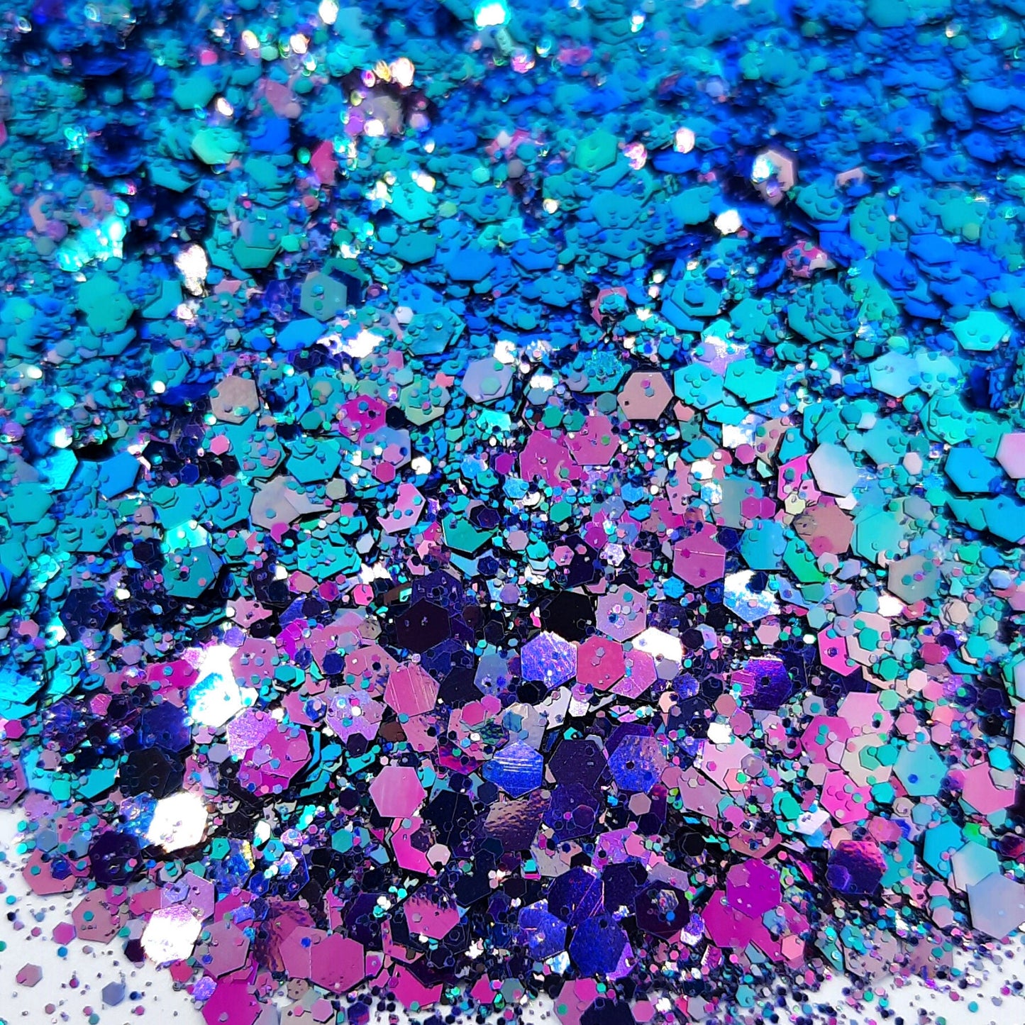 Sirius Glitter Mix A a strong and bright colour mix of teal, blue's and purples flecked with holographic & iridescent rainbow colours, so pretty!