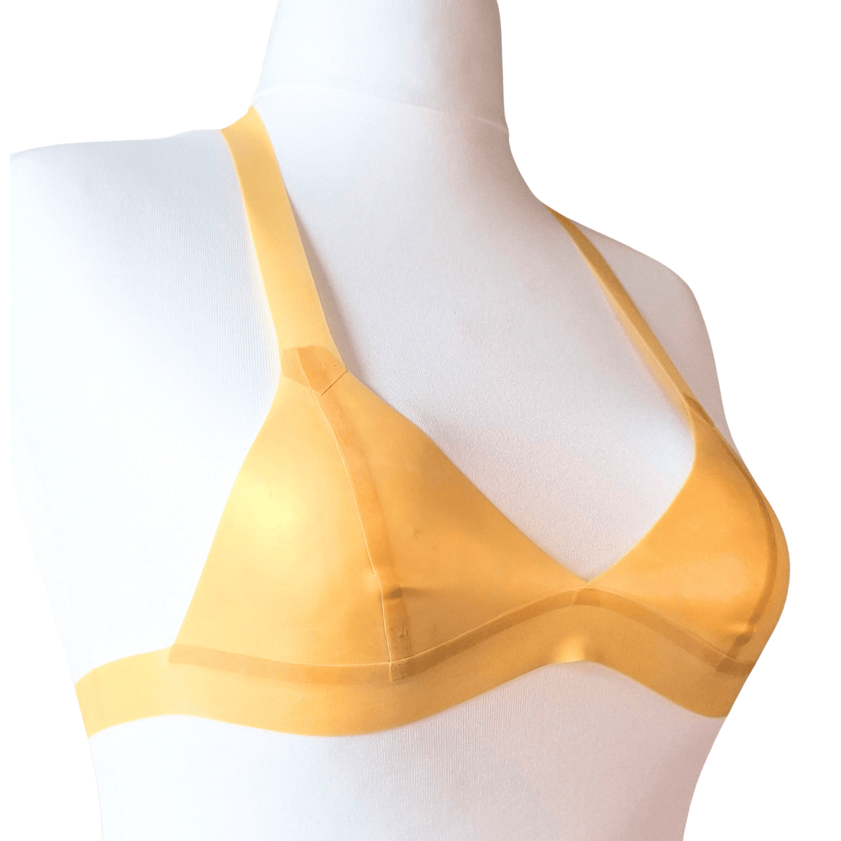 A cute pearlsheen gold latex bikini bralette in size small - Small cups UK A/B with a 66cm band - stretches up to 75cm ish

Brand new sample, made for photo's

Non Wired, bikini style with halter neck strap
