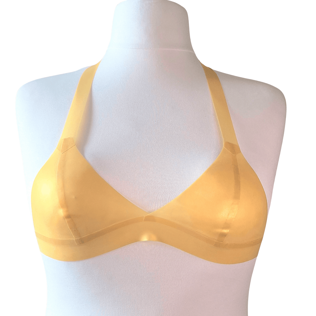 A cute pearlsheen gold latex bikini bralette in size small - Small cups UK A/B with a 66cm band - stretches up to 75cm ish

Brand new sample, made for photo's

Non Wired, bikini style with halter neck strap