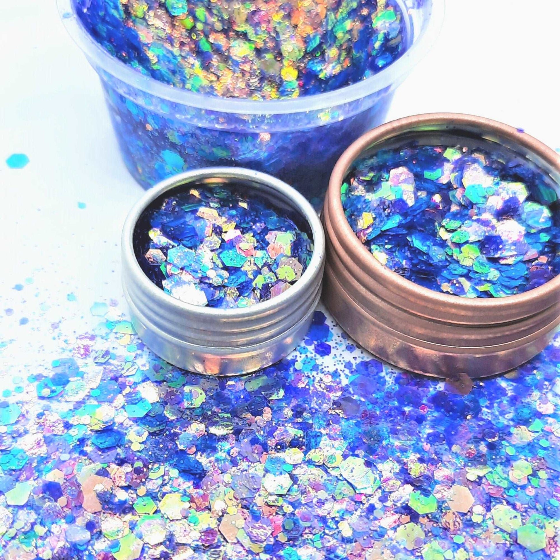 Galaxy dust cosmetic glitter mix:  A really lovely mix of purple and blues with hints of greens and golds flecked with pinks and purples, such an amazing holographic colour