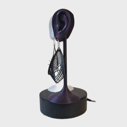 Black Laser Cut Latex Oval Twist Drop Earrings