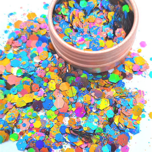 Monkey Farts Cosmetic face & body Glitter. Mix of gold, teal, blue, pink and greens